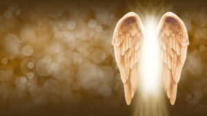 - Wide golden brown bokeh background with a large pair of Angel Wings on the right side and a shaft of bright light between